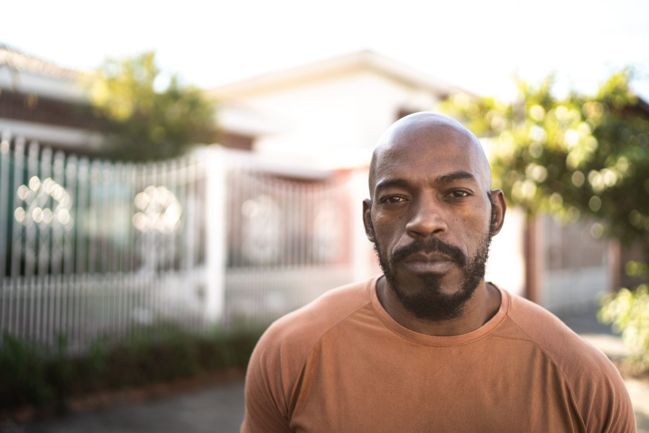 Portrait of a serious mature man in the street